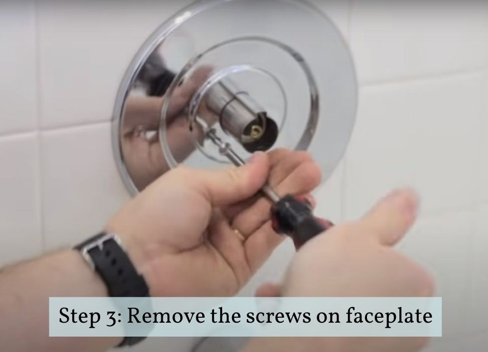 removing the faceplate screws of shower handle