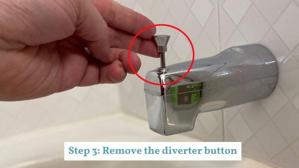 Removing kohler shower handle diverter button 