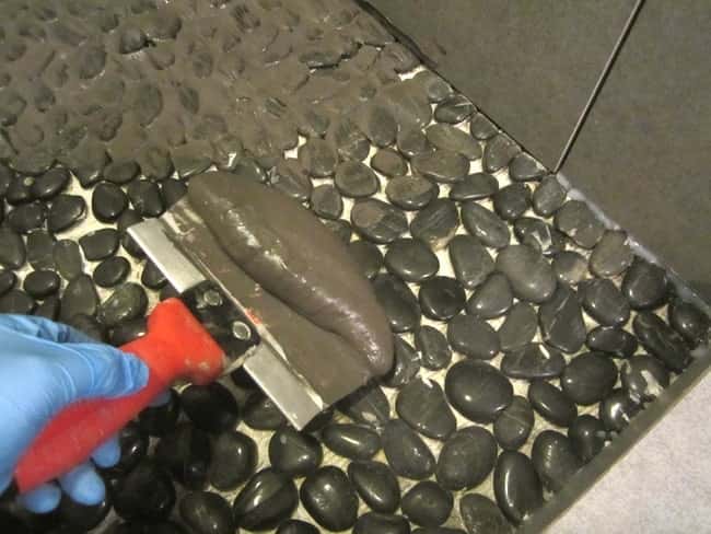 Grouting pebble tiles