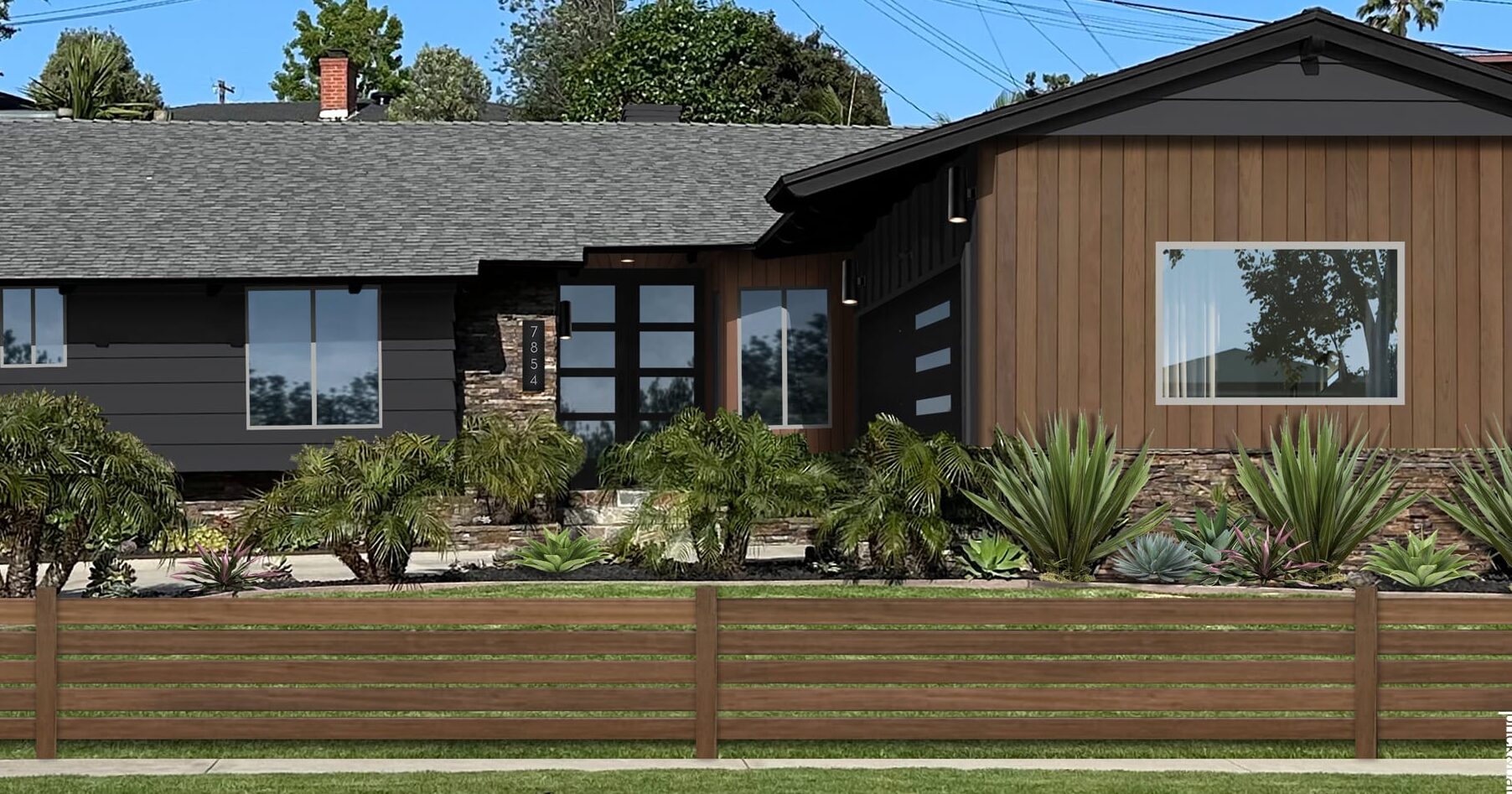 A wooden house and black roof and glass window and wooden fencing around house