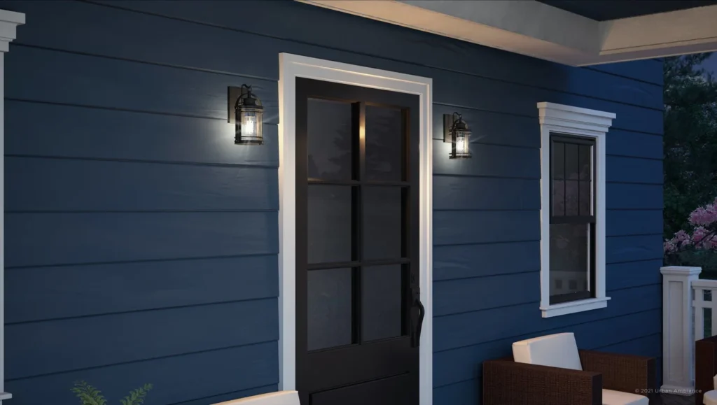 Black light sconces on blue house and black front door