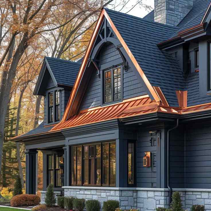 Dark blue house with copper awnings and black windows