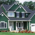 Green House with White Trim Featured image