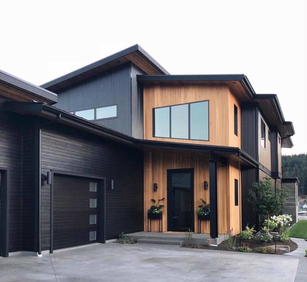 Black house with wood accents