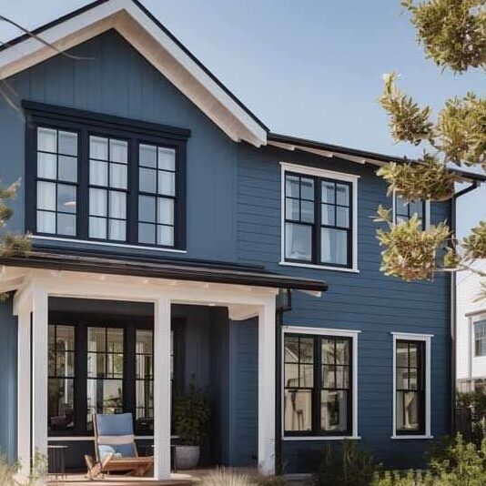 Blue house with trim and black framed windows