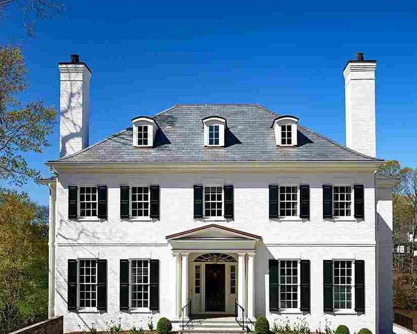White house with black shutter and black windows