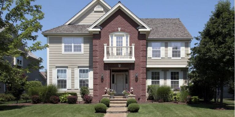 brick and siding house featured image