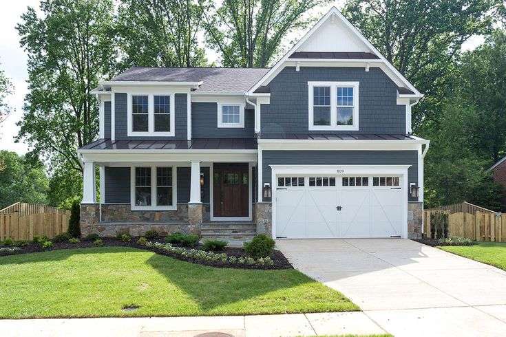 Garage door on blue house and wooden door