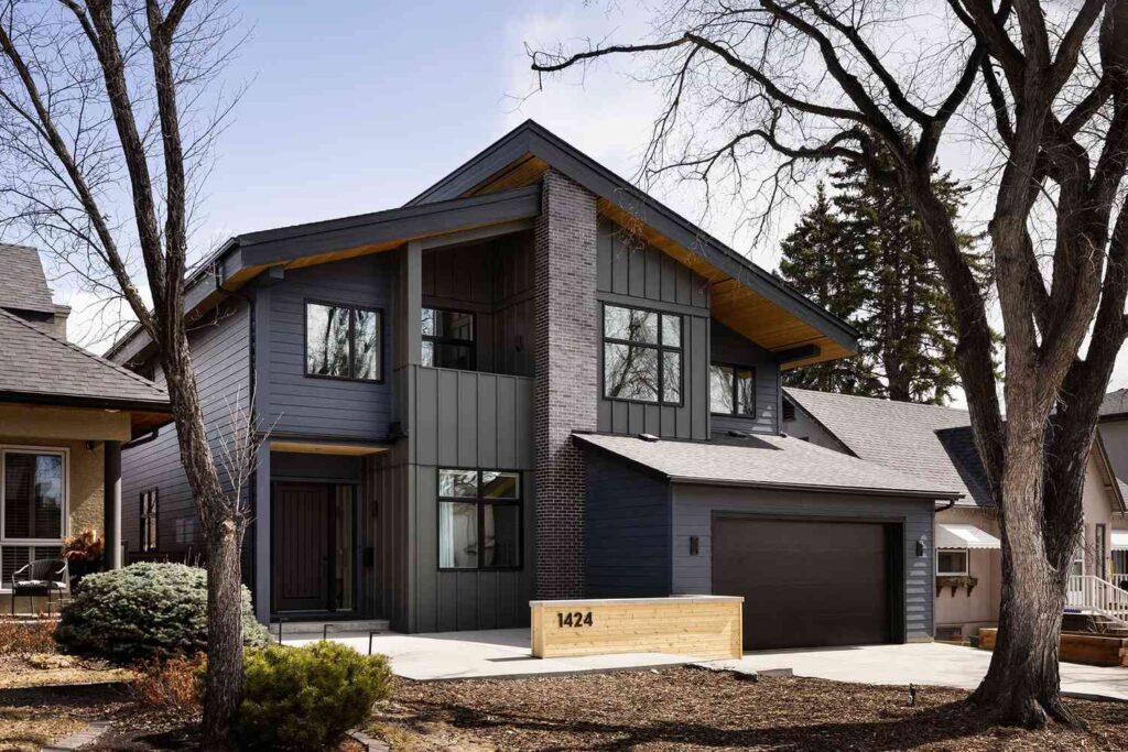 A house and black framed house and black garage door