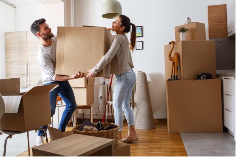 people moving boxes for new home