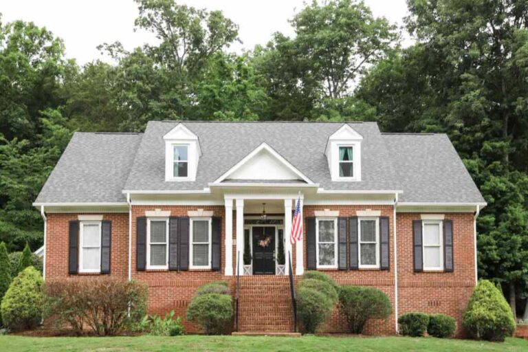 red brick house with charcoal trim featured image