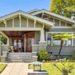 sage green house with black trim featured image