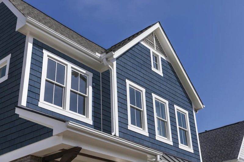White fascia on blue house and white windows