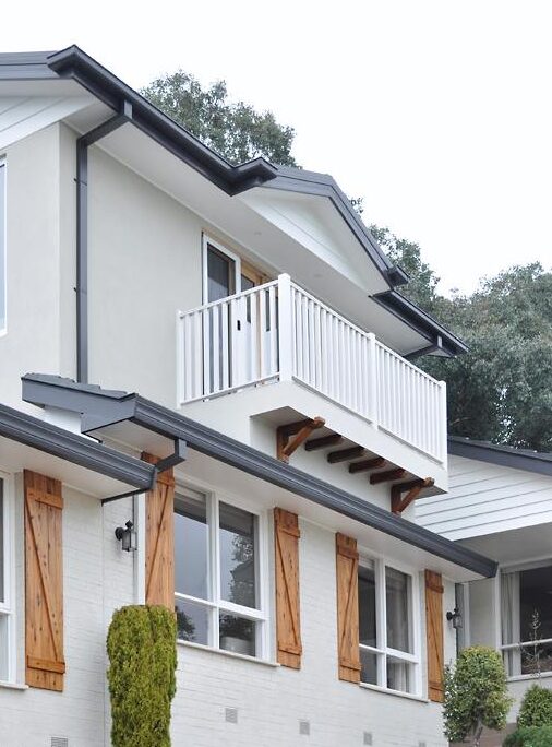 White house and wood shutter and white balcony