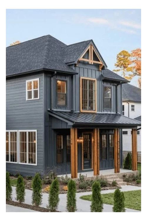 Wooden pillars and white framed windows and black framed windows