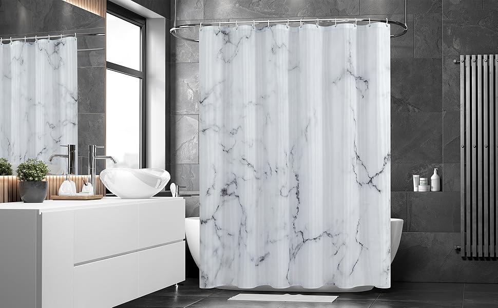 White shower curtain in grey bathroom and white deck and sink 