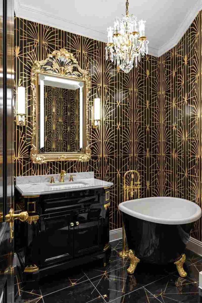 A gold bathroom with black bathtub with gold trim