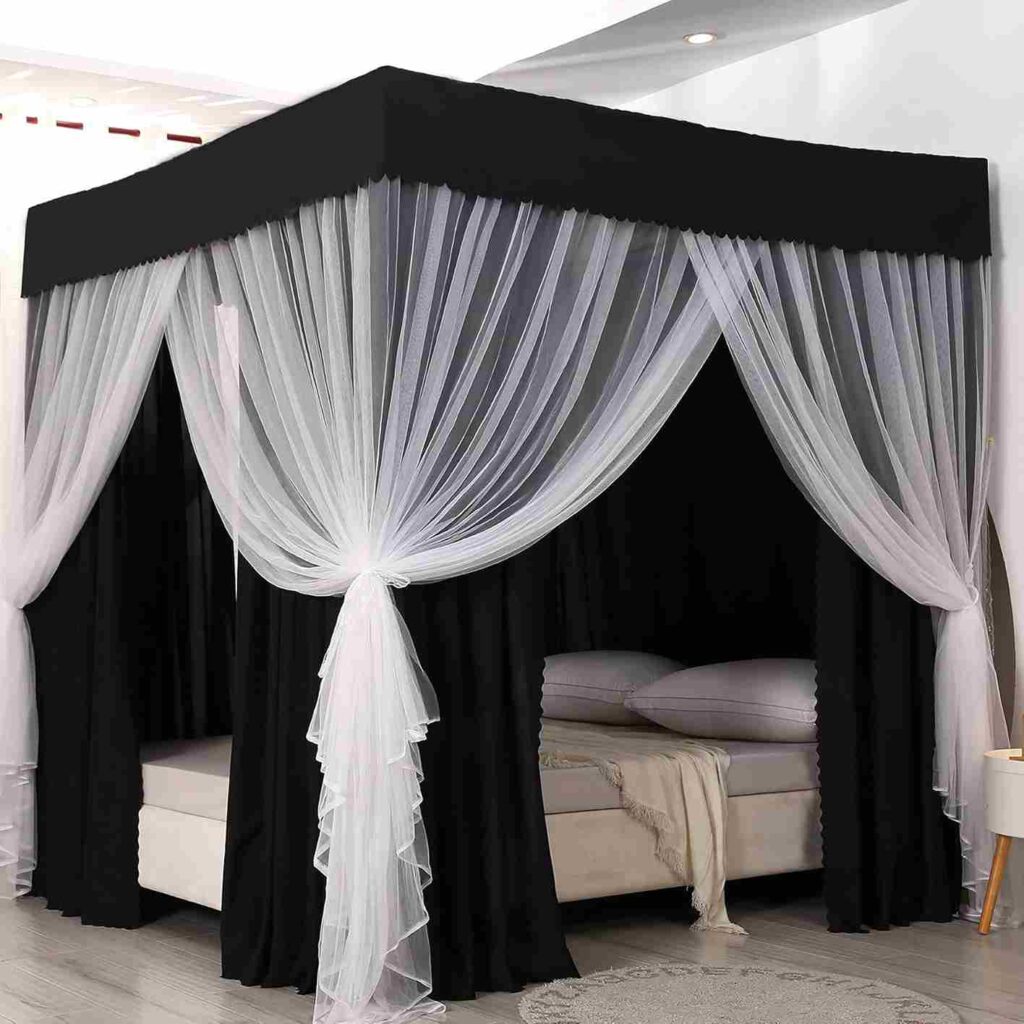 Black canopy bed with white Curtains 