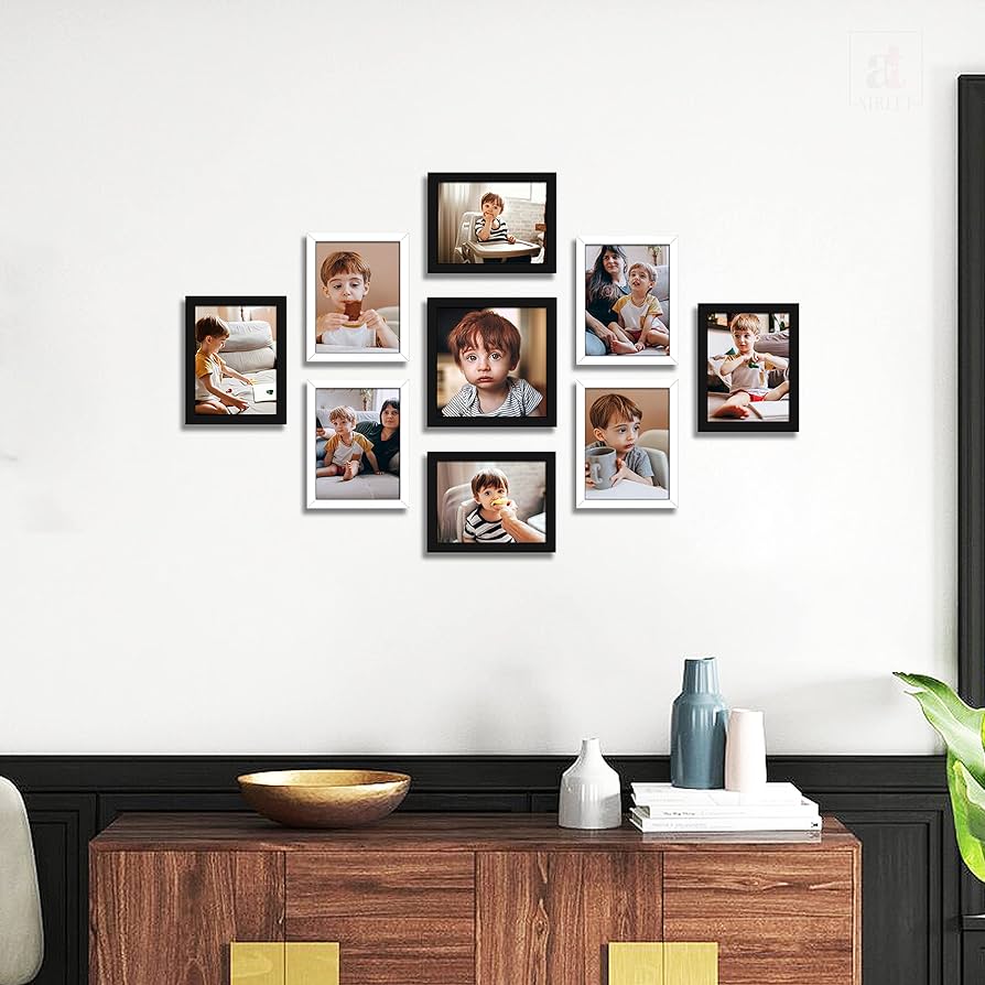 Black photo framed on the white wall