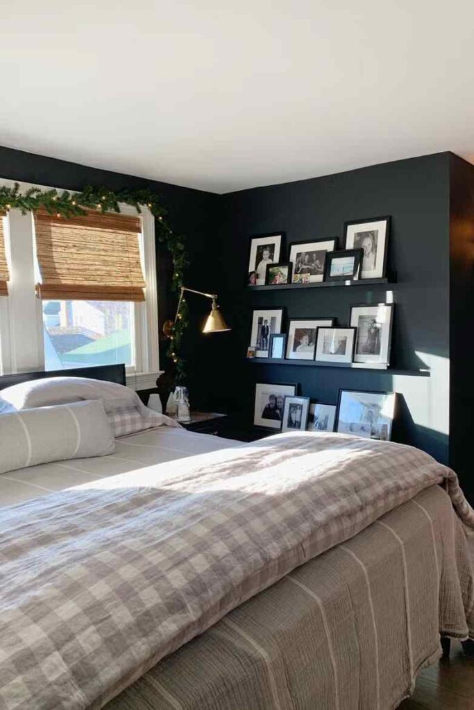A black bedroom with black shelves in room 