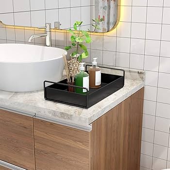 Black vanity tray in white bathroom and white sink and steel tap