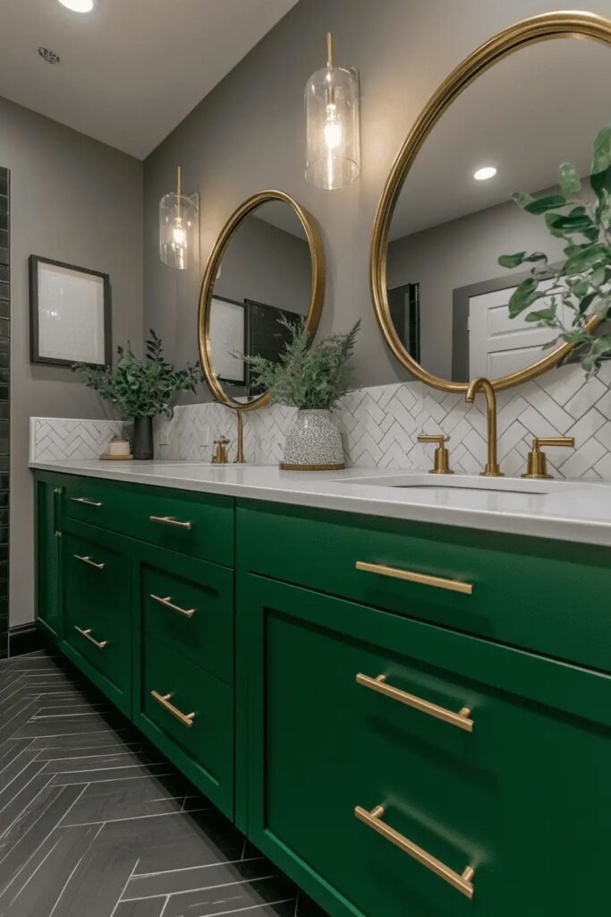Dark green vanity with gold fixtures and gold mirror and lights on the wall 