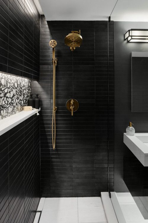 Gold shower with black bathroom