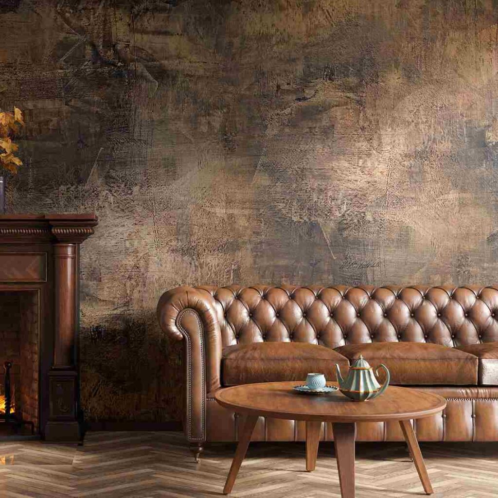 A grey and Brown Textured wallpaper and sofa with table and wooden flor