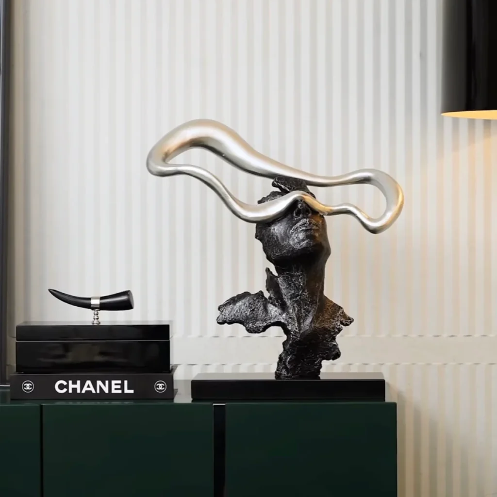Metal black sculptures in white living room