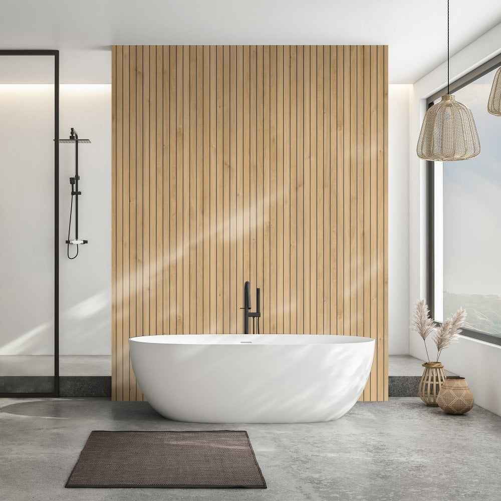 A wooden panels on white bathroom with bathtub and light above the wall 