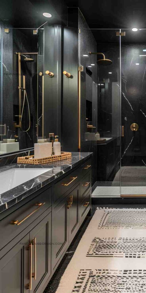 Black cabinetry with gold trim in black bathroom