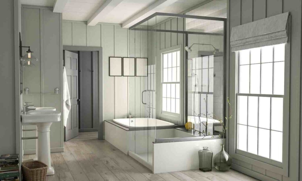 A grey board and batten bathroom and windows and a bathtub