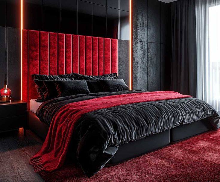 A black bedroom with red velvet bed and red rug on the floor 