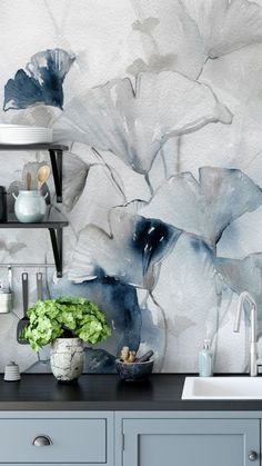 A living room with blue vanity and vase on it 