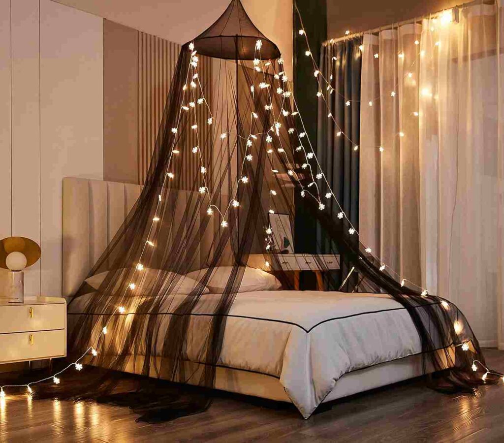 A Black canopy with grey or black curtains in bedroom 