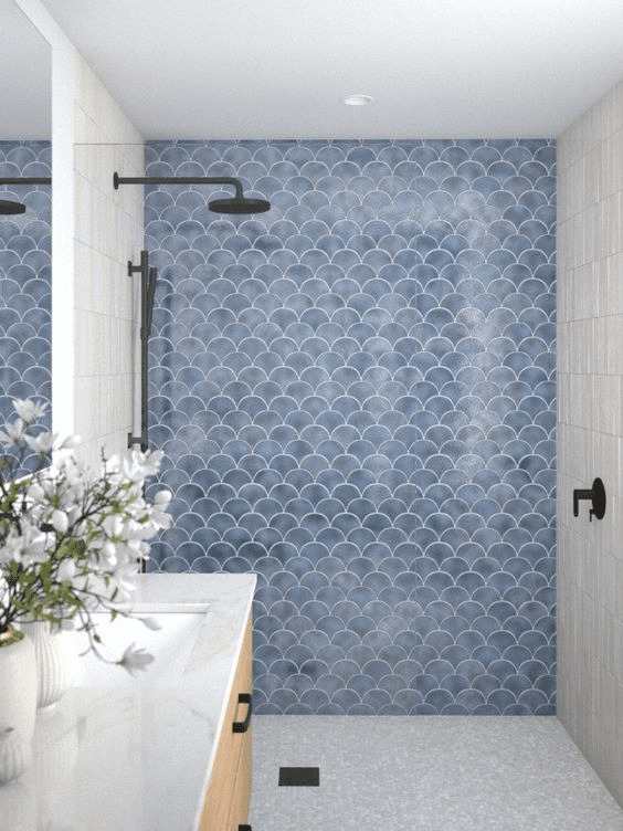 A blue and grey wall with black fixture 