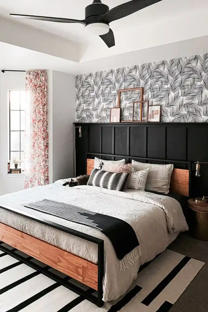 A board and batten bedroom with wallpaper 