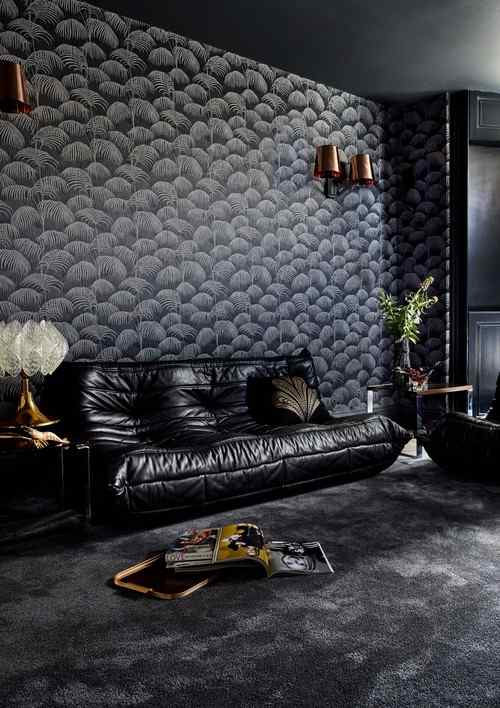 A grey wallpaper in black living room with black floor 