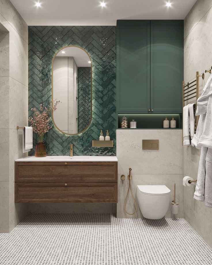 A sage green bathroom with wooden vanity and mirror on the wall and floor 