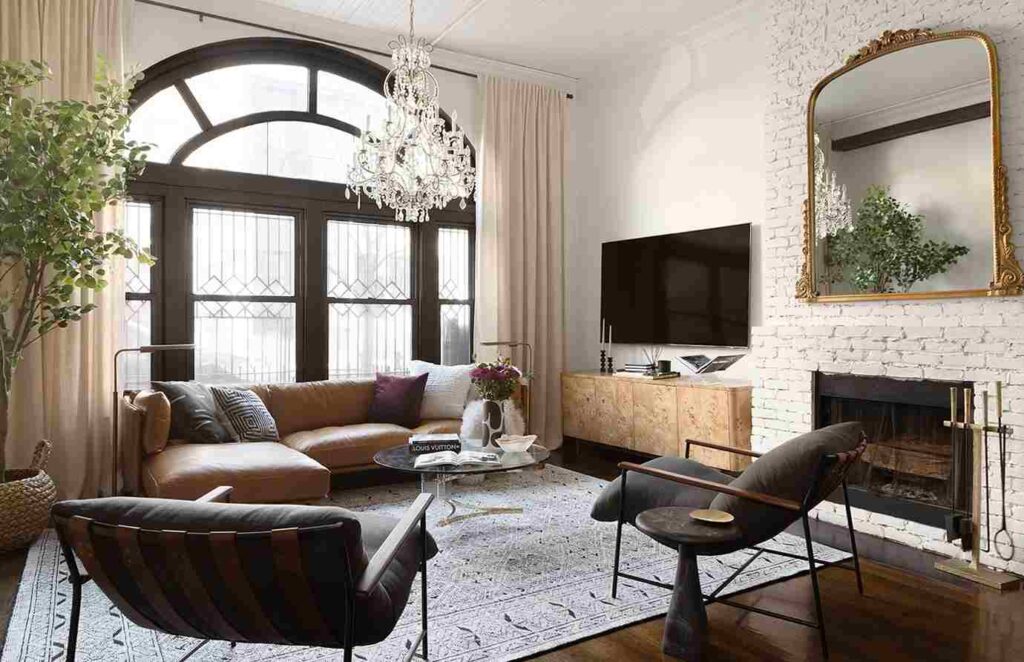A beige living room with tv and mirror on the wall 