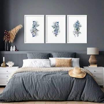 A white frames on the wall and grey bedroom 