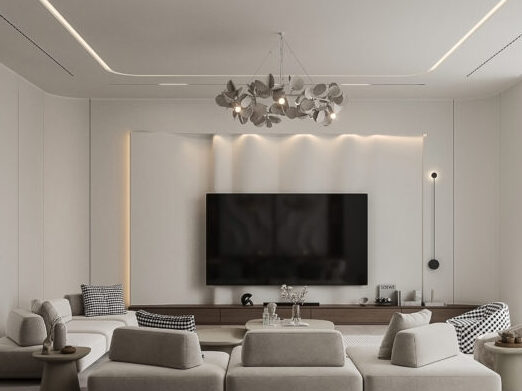 A light in a small living room and tv on the wall 