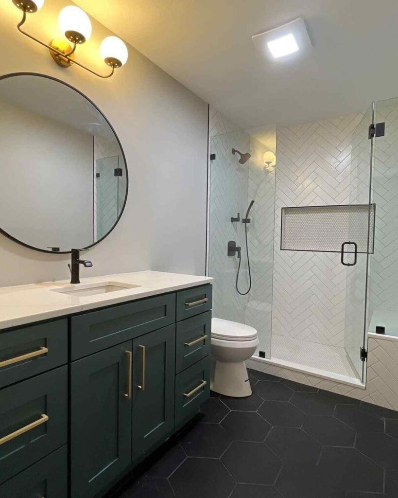 A sage green cabinets and with grey bedroom and black floor 