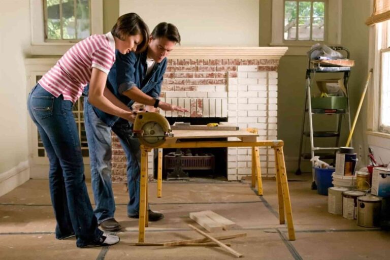 two people doing home renovation
