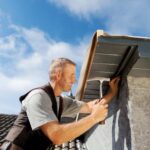 a person fixing the roof