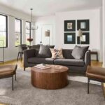 grey-sofa-with-pillows-and-two-matching-grey-armchairs