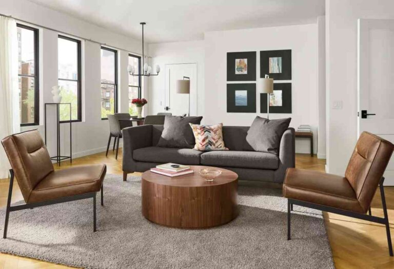 grey-sofa-with-pillows-and-two-matching-grey-armchairs