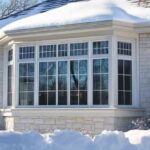 multi-panel-window-surroundings-are-covered-with-snow