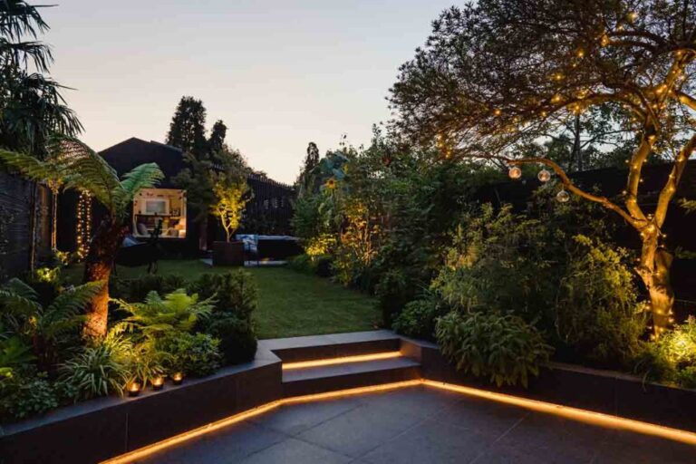 the-garden-with-paved-area-and-with-various-lights-trees-plants