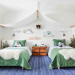 a-children-room-two-separated-beds-and-wooden-table